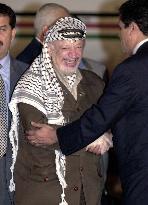 Arafat arrives in Tokyo